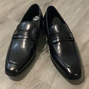 Calvin Klein black faux leather dress shoes